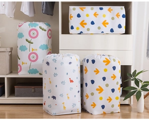 Detail view of PEVA quilt storage bags with colorful animal prints in a closet