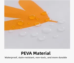 Macro shot of waterproof PEVA fabric with water droplets on the printed storage bag