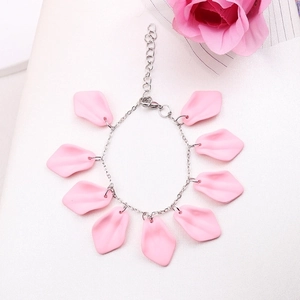 Detail of bohemian pink petal charms on silver chain with lobster clasp and extender