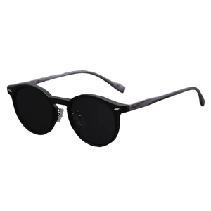 Retro round matte sunglasses with black frames and gray marble textured temples