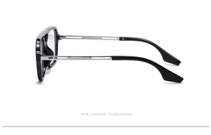Detail of reinforced metal hinges and dual-material temples on black square sunglasses