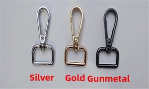 Detail of swivel lobster clasps in silver, gold, and gunmetal finishes for bags