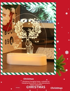 Detail view of 3D acrylic Christmas reindeer night light with warm LED glow and desk decor