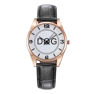 Minimalist quartz watch with rose gold case and black leather strap featuring DOG design