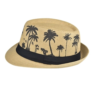 Close-up of the woven texture and black palm tree print on the beige linen sun hat