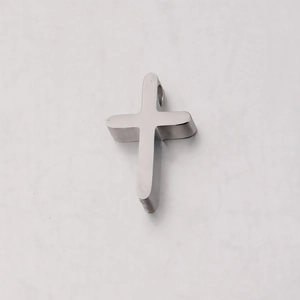 Polished silver stainless steel cross pendant for DIY jewelry making on white background