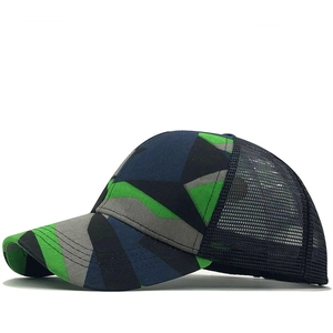 Side view of camouflage baseball cap with breathable dark blue mesh and curved visor