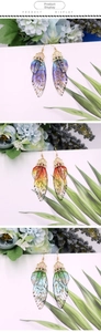 Detailed view of S925 silver butterfly earrings with gradient wings and gold foil
