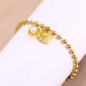 Golden titanium steel beaded bracelet with shell pendants, micro-set zircons and pearls