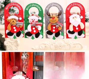 Detail of felt Christmas door hangers featuring Santa, snowman, elk, and bear characters
