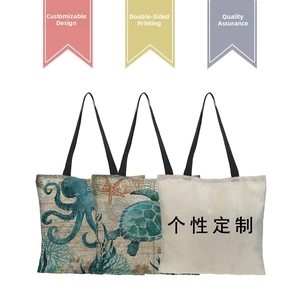 Detail of 3D printed turtle and octopus linen tote bags with black shoulder straps