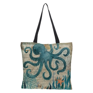 Detail of vintage marine print on waterproof linen tote featuring a blue octopus and starfish