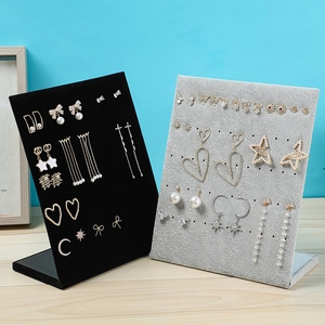 L-shaped velvet earring display stand in black and grey for jewelry storage and presentation