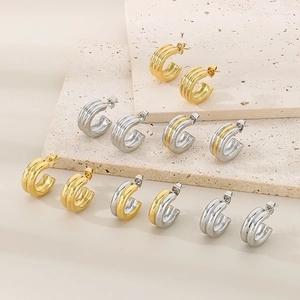 Classic French style chunky C-shaped stainless steel hoop earrings in gold and silver