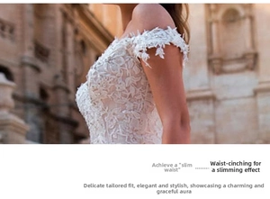 Detailed embroidery on white lace wedding dress with waist-slimming fit and floral patterns