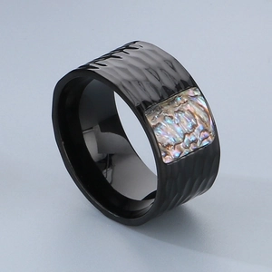 Black hammered stainless steel ring for men featuring an iridescent abalone shell inlay
