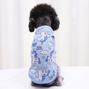 Detail of light blue unicorn pet vest showing breathable fabric texture on a poodle