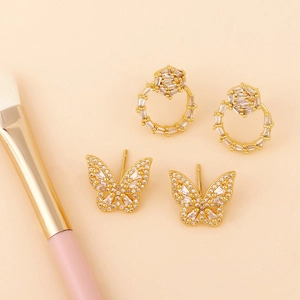Elegant gold butterfly and geometric stud earrings with sparkling cubic zirconia pavé