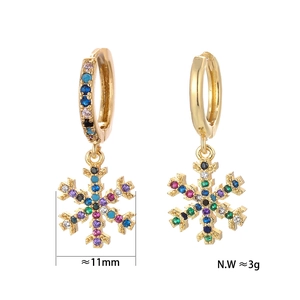 Detailed view of colorful zircon snowflake earrings with 11mm diameter and golden finish