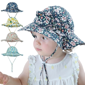 Details von Baby-Sonnenhüten aus Baumwolle mit Blumenmuster, Kinnriemen und großer Schleife