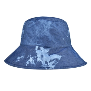 Detail of blue tie-dye pattern on a cotton bucket hat with high-quality stitching