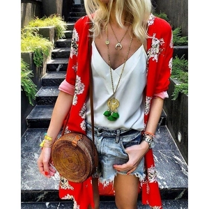 Bohemian floral chiffon cardigan with camisole and denim shorts for summer beach vacation