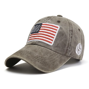 Close-up of vintage washed cotton baseball cap with embroidered American flag and USA patch