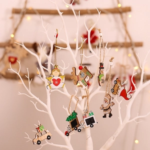 Colorful wooden Christmas ornaments set featuring Santa, reindeer and snowman on a tree