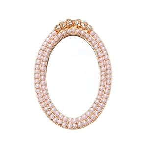 Oval gold makeup mirror with pearl frame and crown rhinestone decor for DIY phone cases