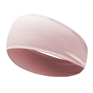 Close-up of seamless pink yoga headband with soft knit texture for athletic wear