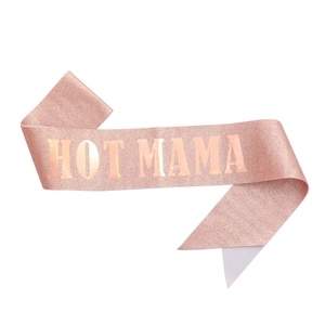 Detail of rose gold glitter sash with HOT MAMA lettering for party photography