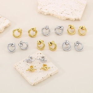 Intertwined geometric titanium steel hoop earrings in gold and silver finish set