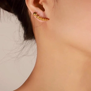Minimalist gold titanium steel crawler earrings with six graduated round metal beads