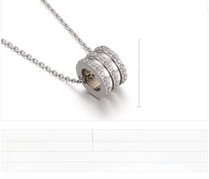 Detailed size specifications for triple-ring cylinder pendant with zircon stones