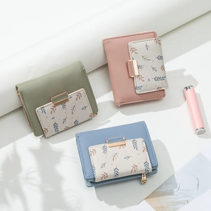 Three PU leather short wallets in green, pink, and blue with leaf prints and FOREVER buckles