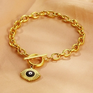 18k gold plated chunky chain bracelet with OT toggle clasp and evil eye pendant detail