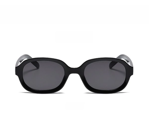Front view of C1 black oval chunky sunglasses with dark grey lenses and retro design