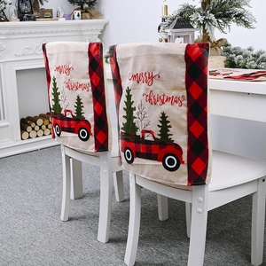 Christmas chair covers featuring red truck and plaid edges for holiday home dining decor
