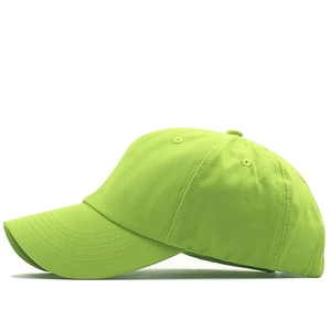 Detailed side view of neon green baseball cap showing stitched cotton twill and air vents