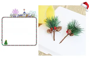 Detail view of artificial pine needles with mini pinecones and red berries for Christmas decor