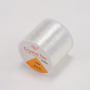 Macro shot of 0.5mm clear elastic beading cord on a 100m spool by Crystal Tec