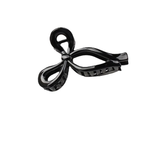 Glossy black hollow butterfly hair claw clip with elegant geometric jelly color design