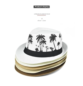 Stack of breathable linen fedora hats in white and khaki with palm tree embroidery