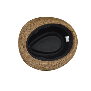 Detailed interior of a woven paper sun hat with black sweatband and size label