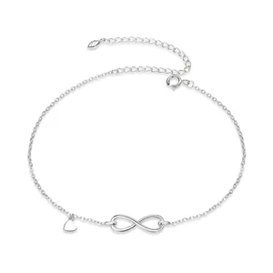 Sterling silver infinity symbol anklet with a small heart pendant and adjustable link chain