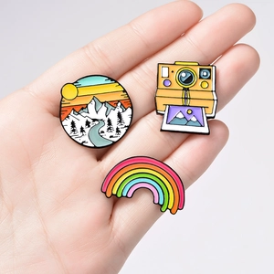 Creative alloy enamel pins set with sunset mountain landscape, camera, and rainbow badges
