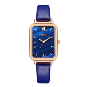 Elegant rose gold rectangular watch featuring a blue marble dial and leather strap