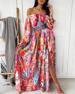 Detail of bohemian floral maxi dress with lantern sleeves and side high slit design