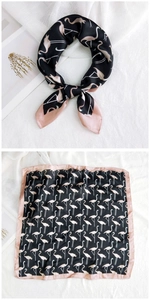 Detail of pink and black flamingo print square silk scarf tied and flat display