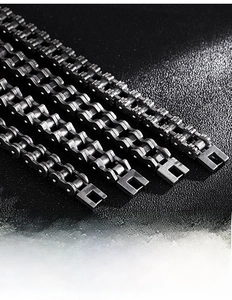 Detailed close-up of motorcycle chain bracelets with secure rectangular clasps